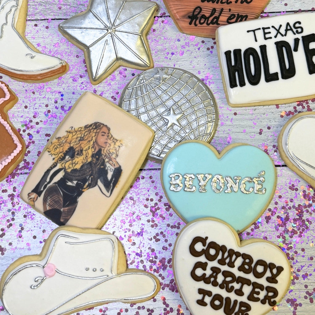 Beyoncé portrait cookie surrounded by themed sugar cookies