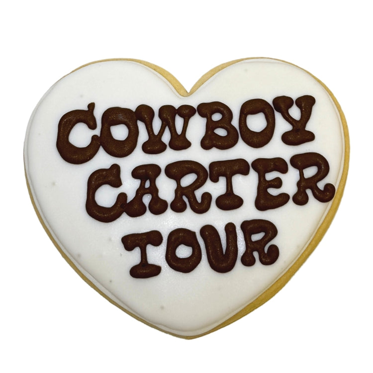 Cowboy Carter heart-shaped sugar cookie with brown icing.