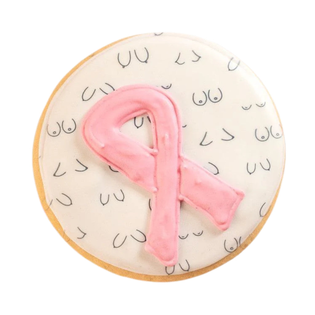 Breast cancer awareness cookie with a pink icing ribbon.
