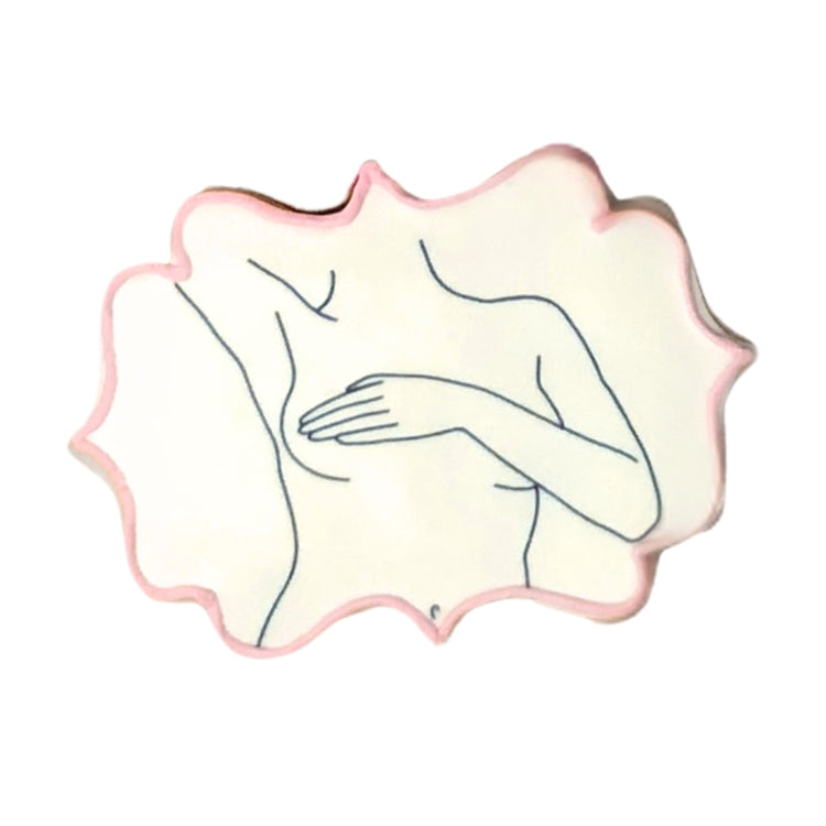 Breast Cancer Awareness cookie with pink outline and line art.