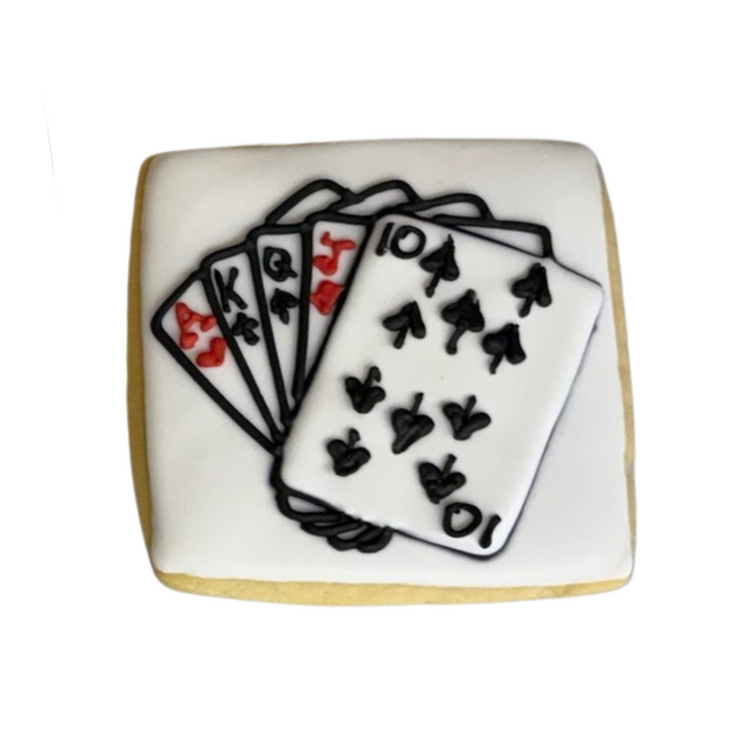 Casino Cookies featuring a hand of playing cards icing.