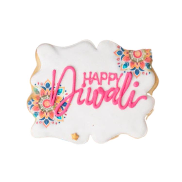 Happy Diwali cookie with pink icing and colorful mandala art.