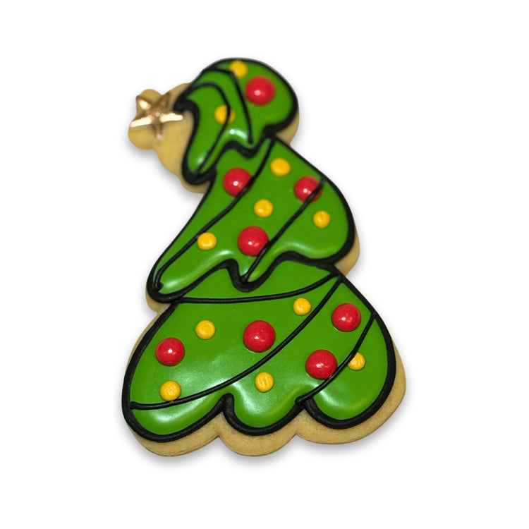 Merry Grinchmas Christmas tree cookie with red and yellow icing.