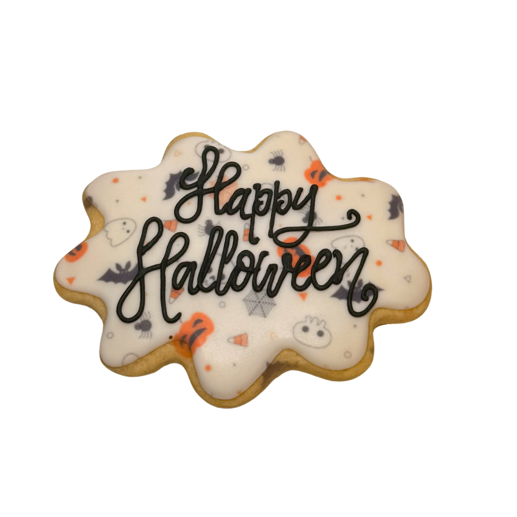 Happy Halloween cookie with festive icing and black lettering.