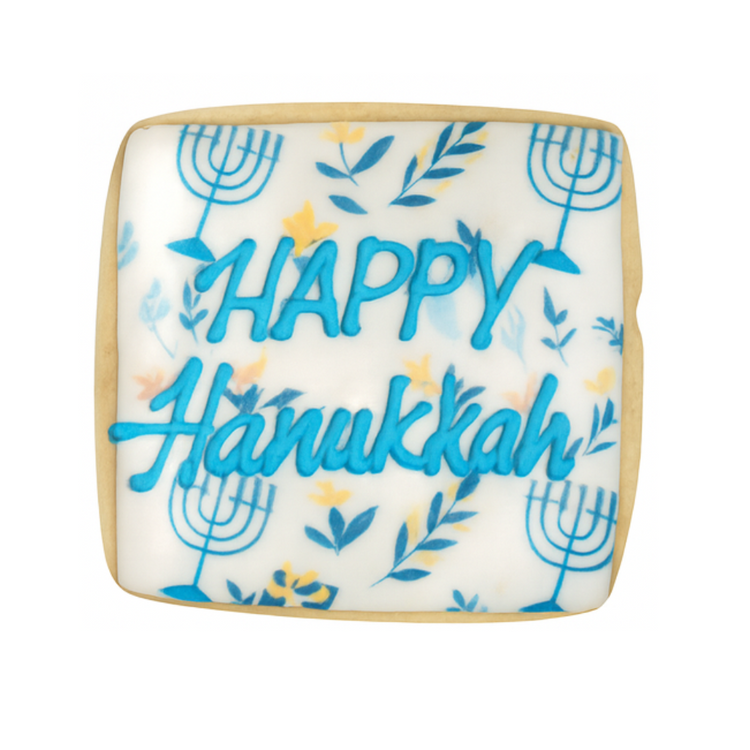 Square Hanukkah cookie with blue menorah and floral icing.