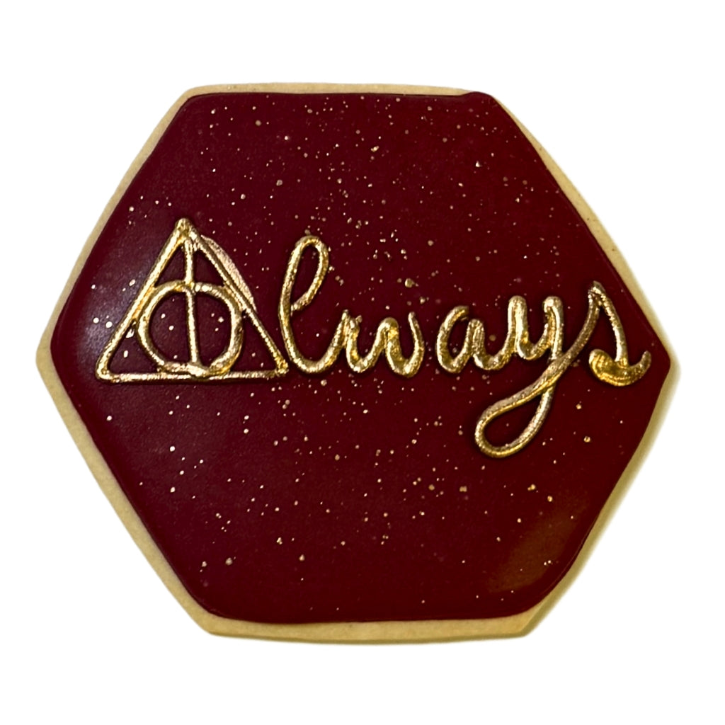 Harry Potter Always cookie with gold lettering on maroon icing.
