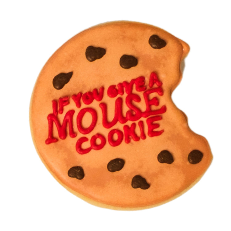 National Reading Month cookie with red icing text and bite mark.
