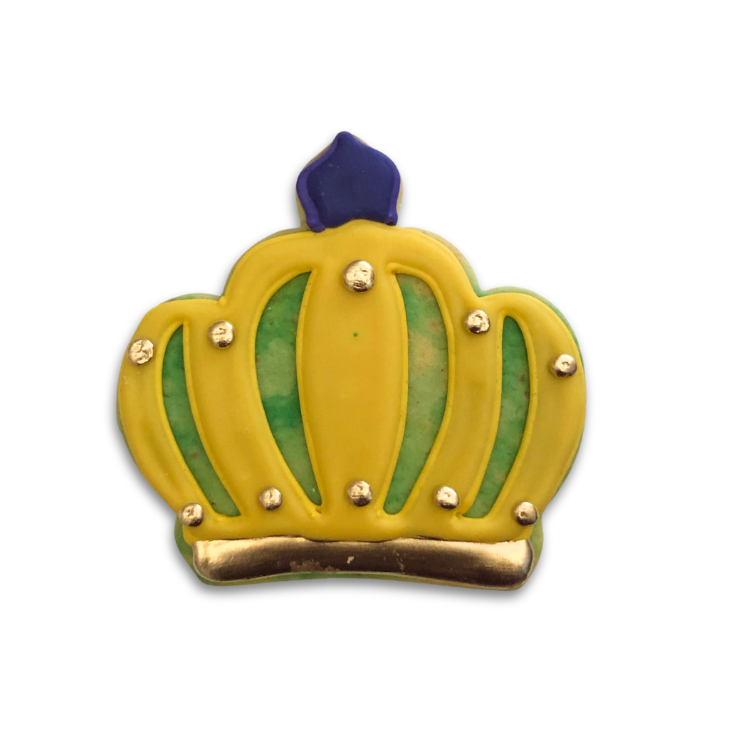 Mardi Gras butter cookie shaped like a yellow and green crown.