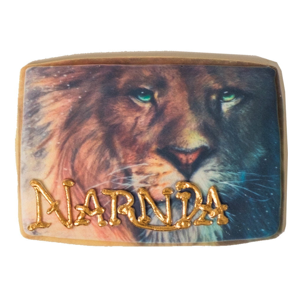 National Reading Month cookie featuring a lion and Narnia text.