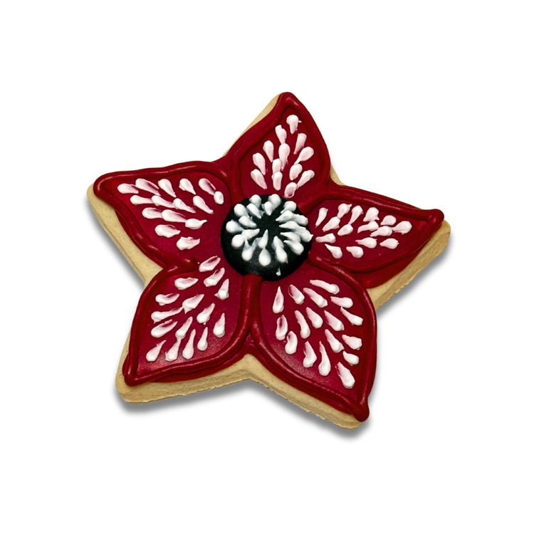 Stranger Cookies shaped like a red and white flower.