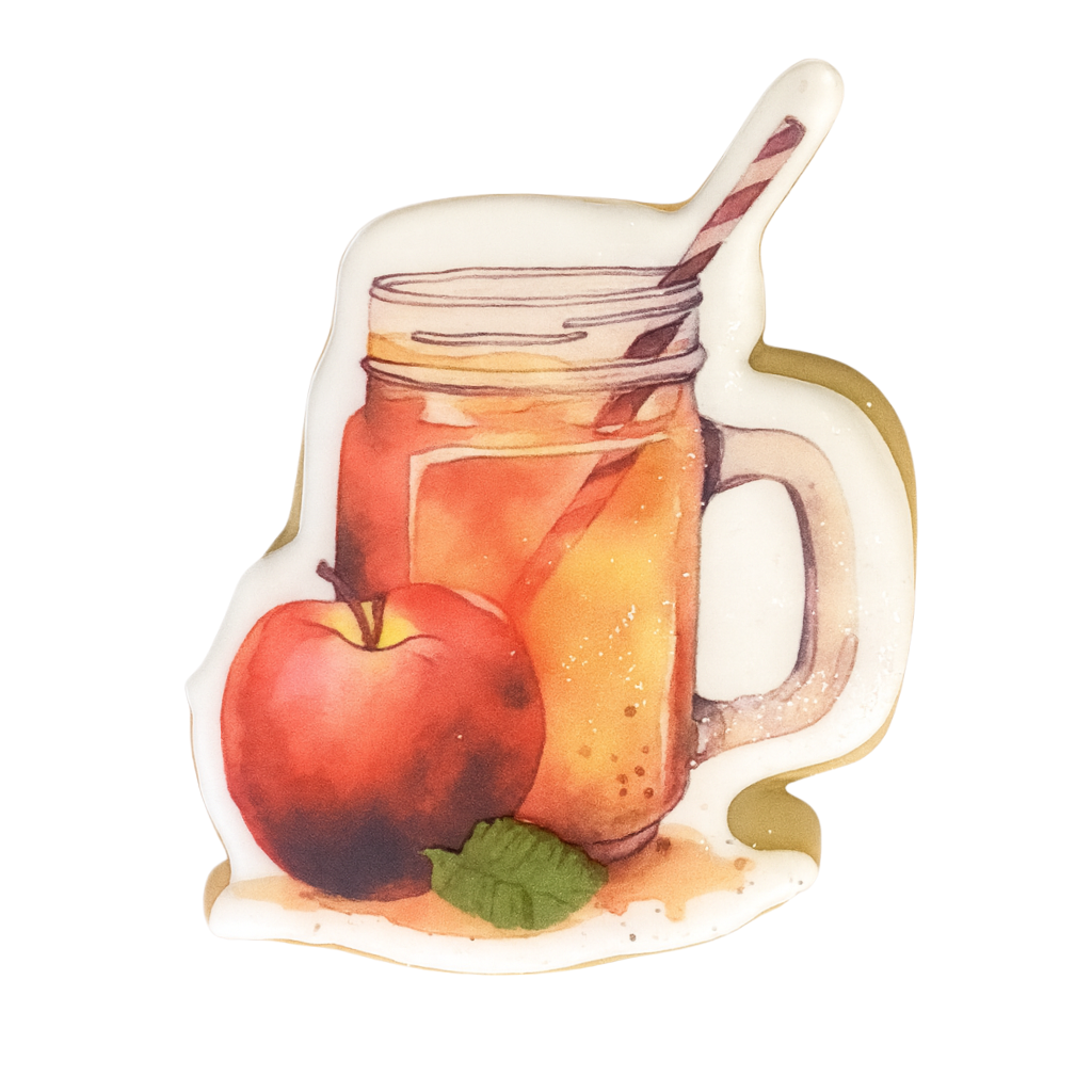 Thanksgiving cookie shaped like apple cider in a mason jar