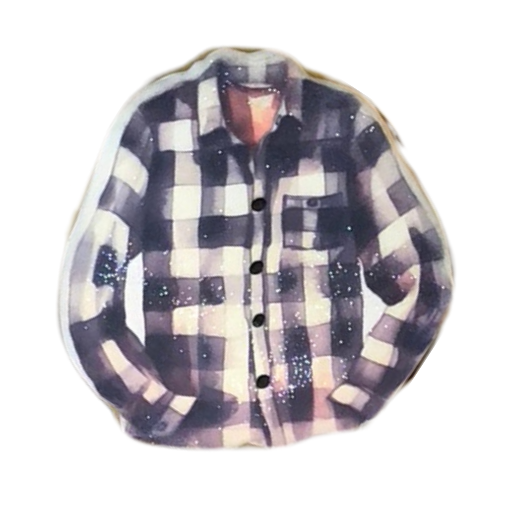 Thanksgiving cookie shaped like a black and white plaid shirt.