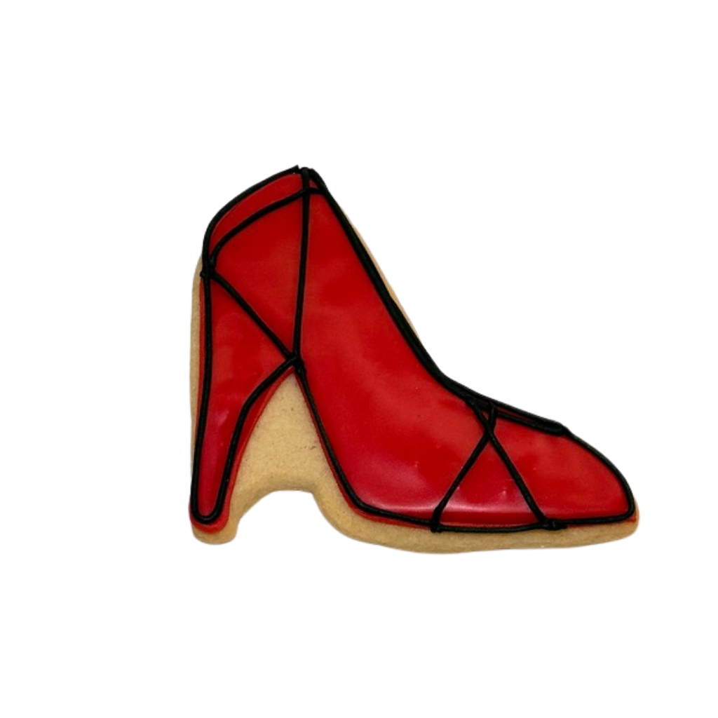The Devil Eats Cookies shaped like a red high-heel shoe.
