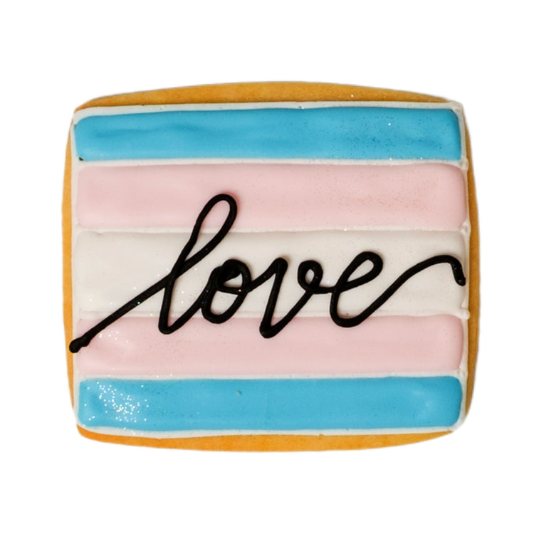 Trans Day of Visibility cookie with blue, pink, and white icing.