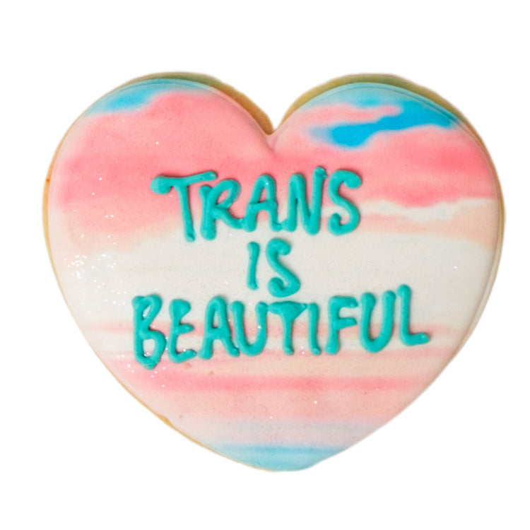Heart-shaped Trans Day of Visibility cookie with blue icing text.