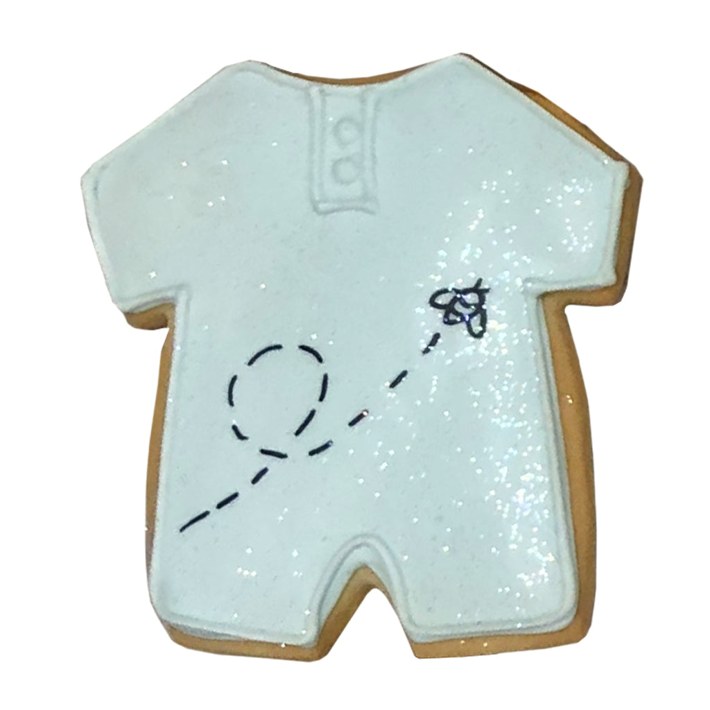 Winnie the Pooh onesie cookie with a glittery white finish.