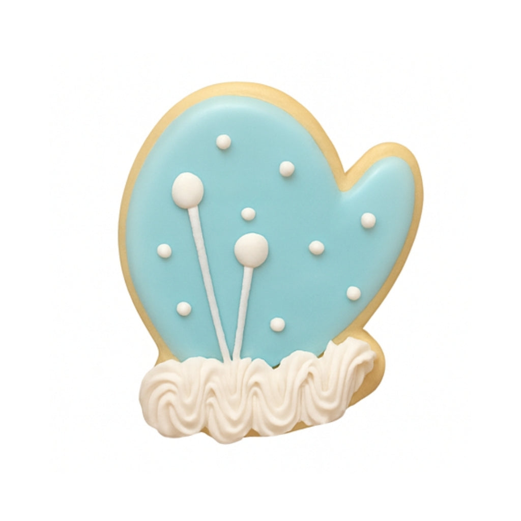 Christmas Couture mitten cookie with blue icing and white trim.