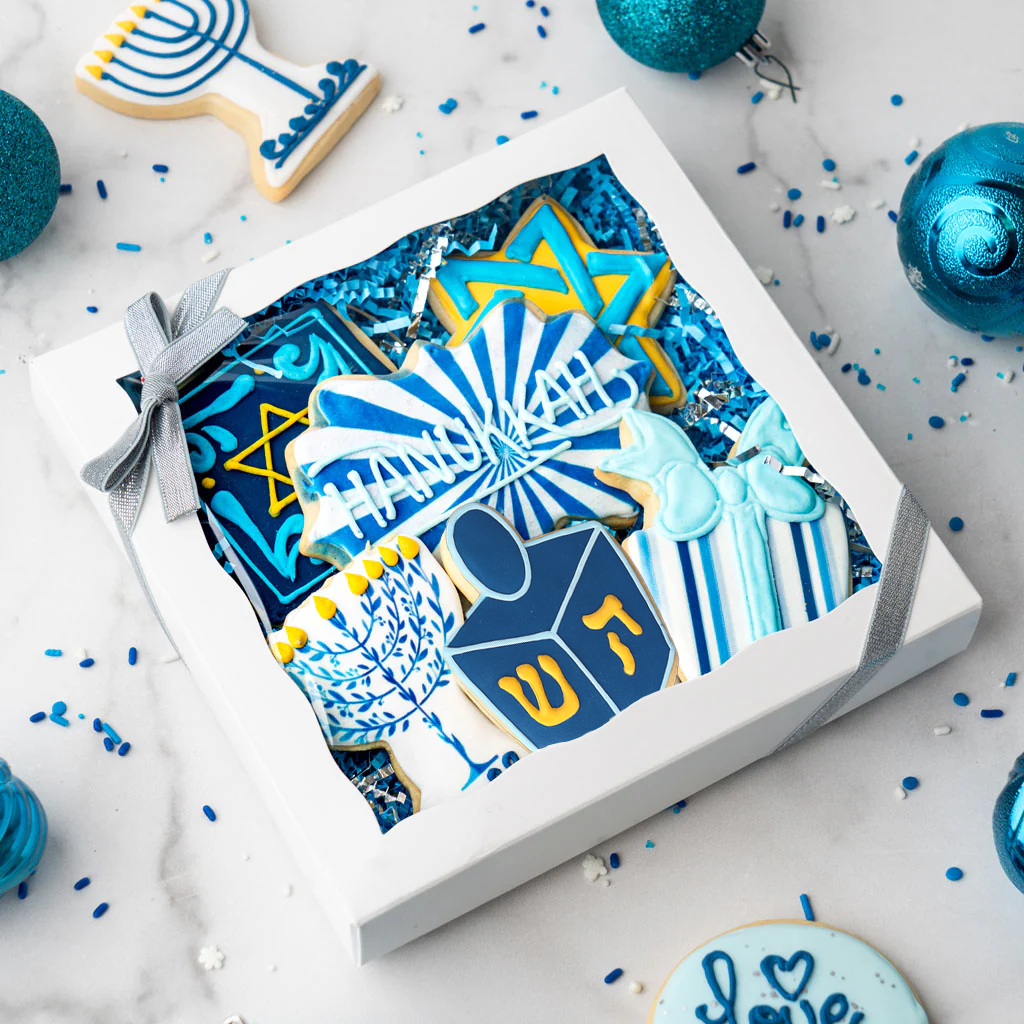 Gift box of Hanukkah butter cookies with blue and white icing.