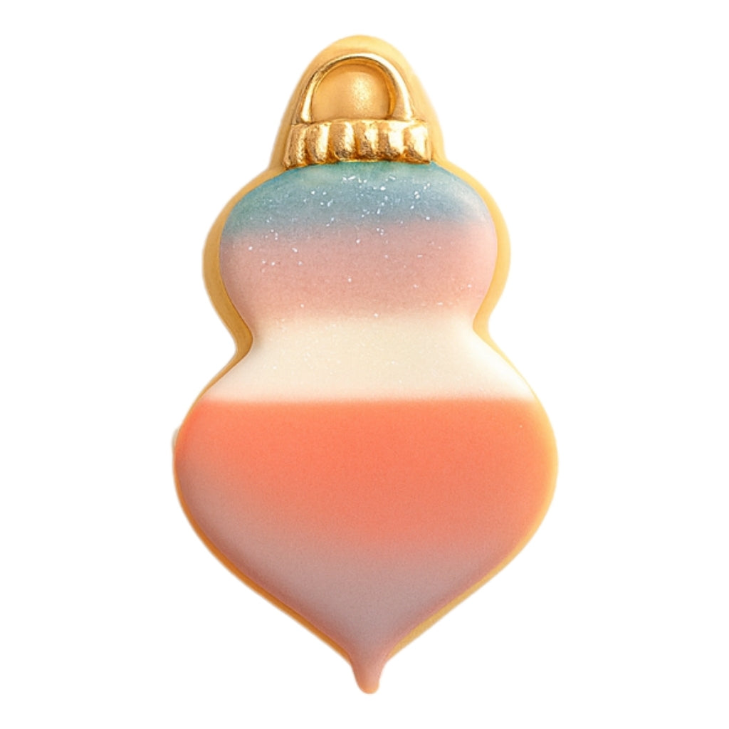 Ornament cookie with a colorful ombre icing design.