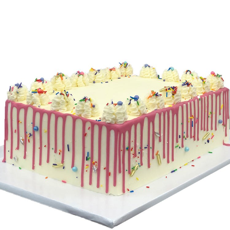 French Vanilla sheet cake with pink drip and sprinkles.