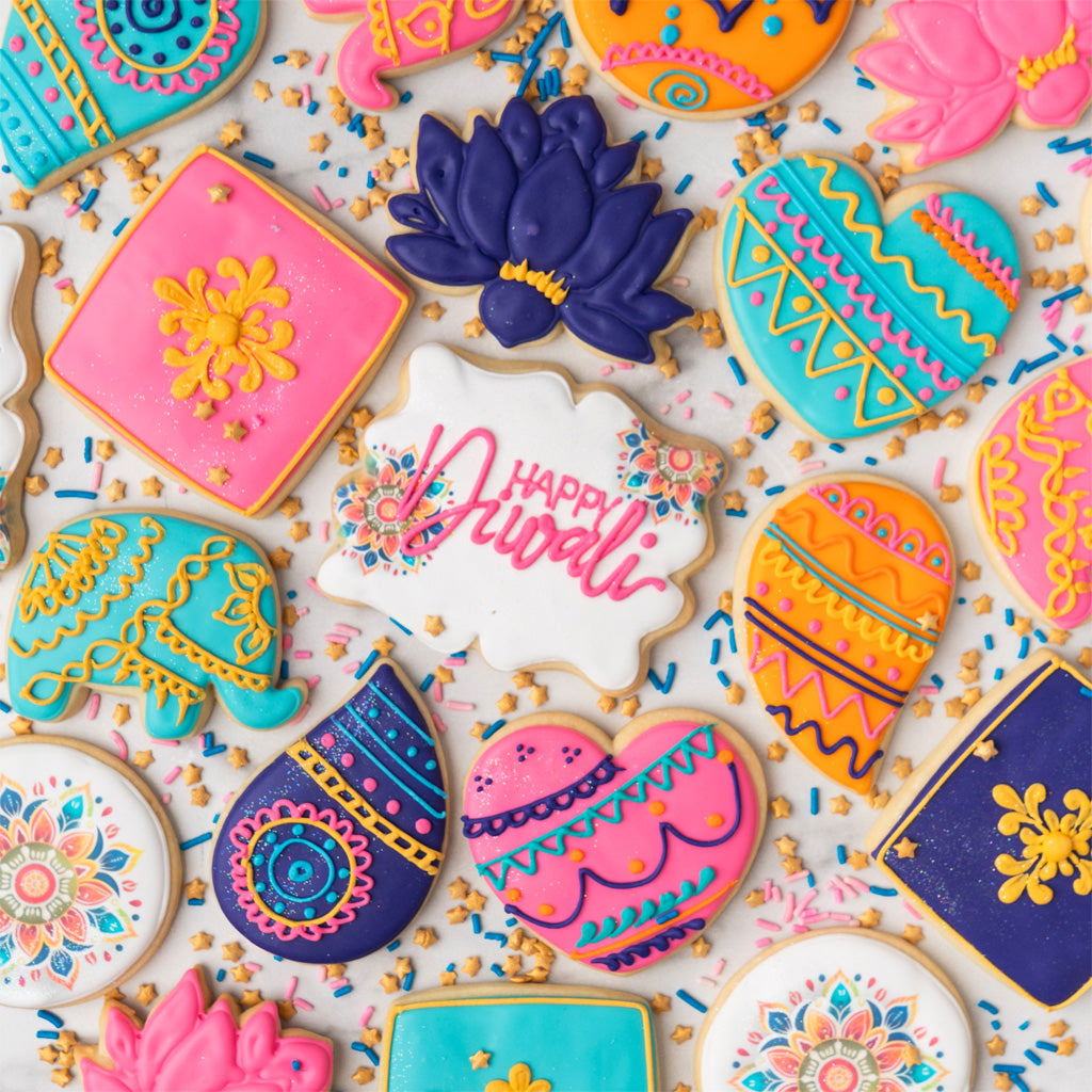 Assorted Diwali cookies with colorful icing and festive patterns.