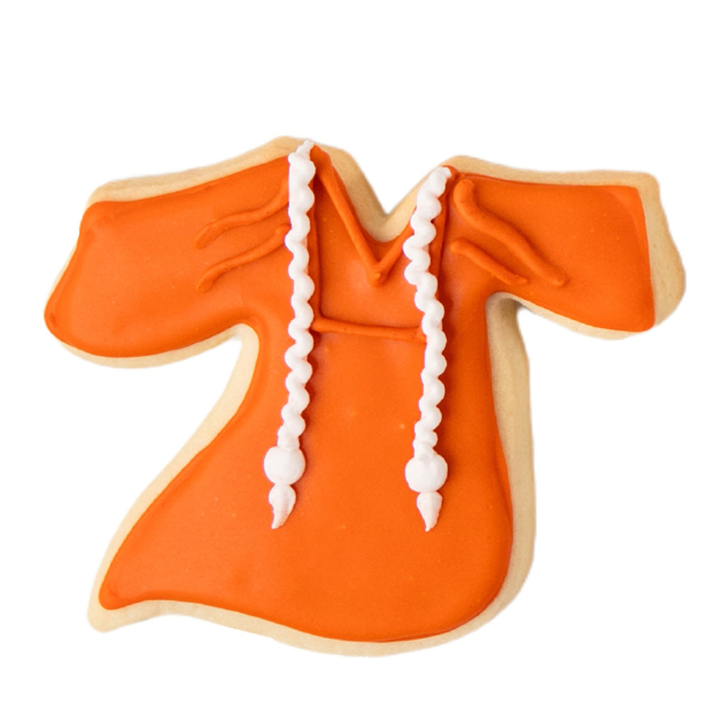 Orange graduation gown cookie with white icing details