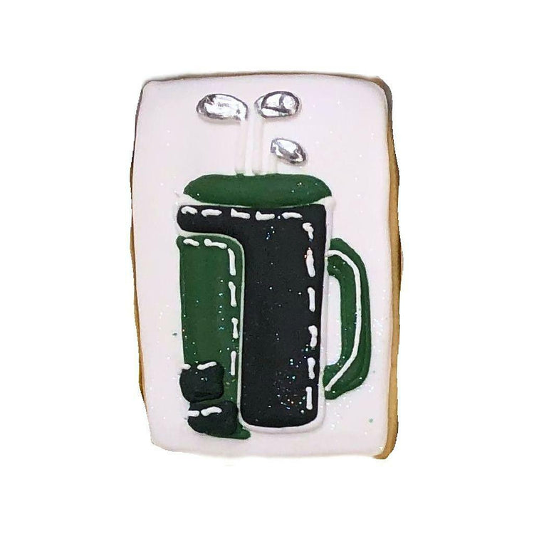 Golf cookie shaped like a green and black golf bag.