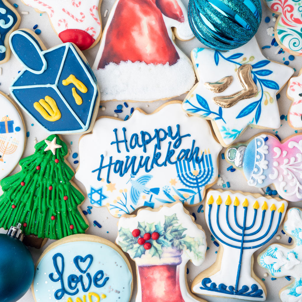 Interfaith butter cookies with holiday-themed icing designs.