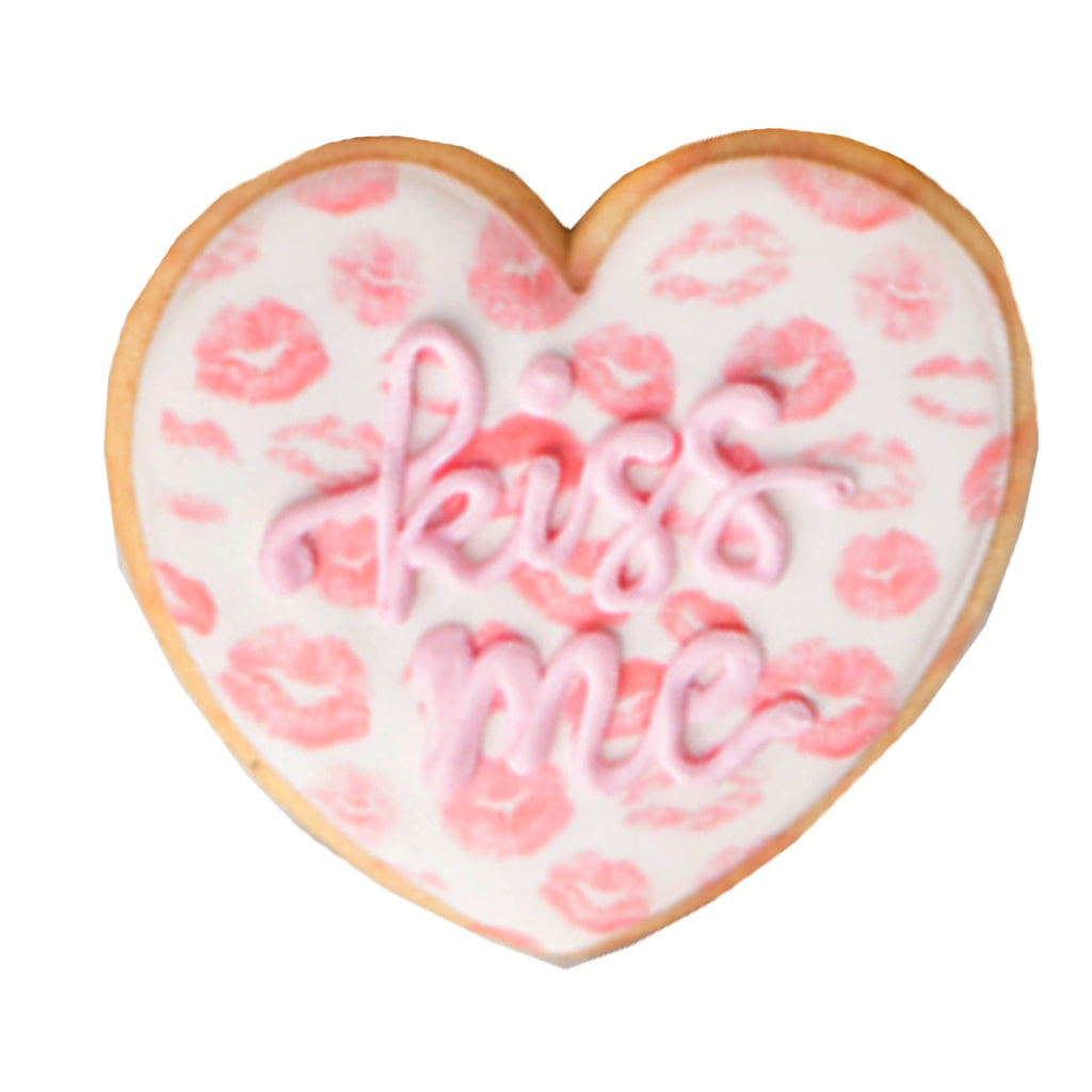 Heart-shaped Valentine butter cookie with kiss print icing.