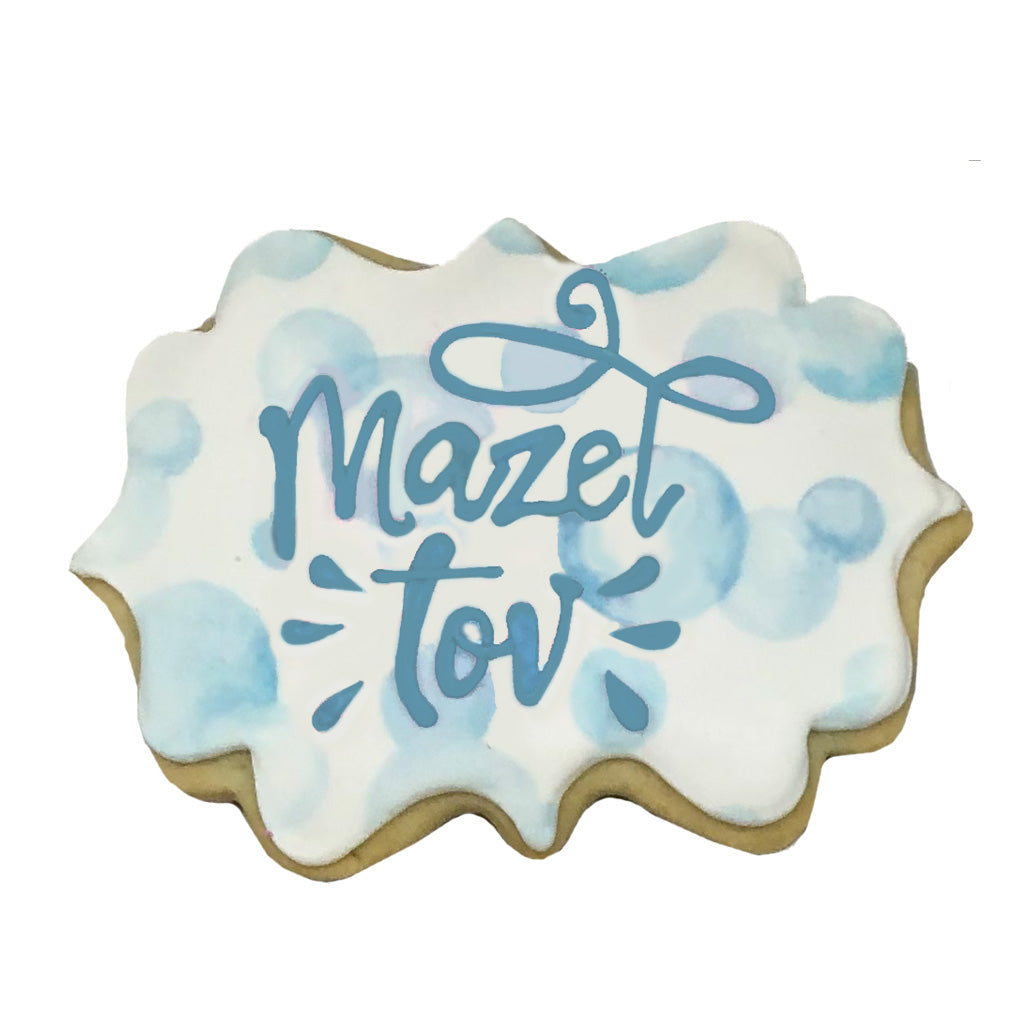 Mazel Tov plaque cookie with blue watercolor circles.