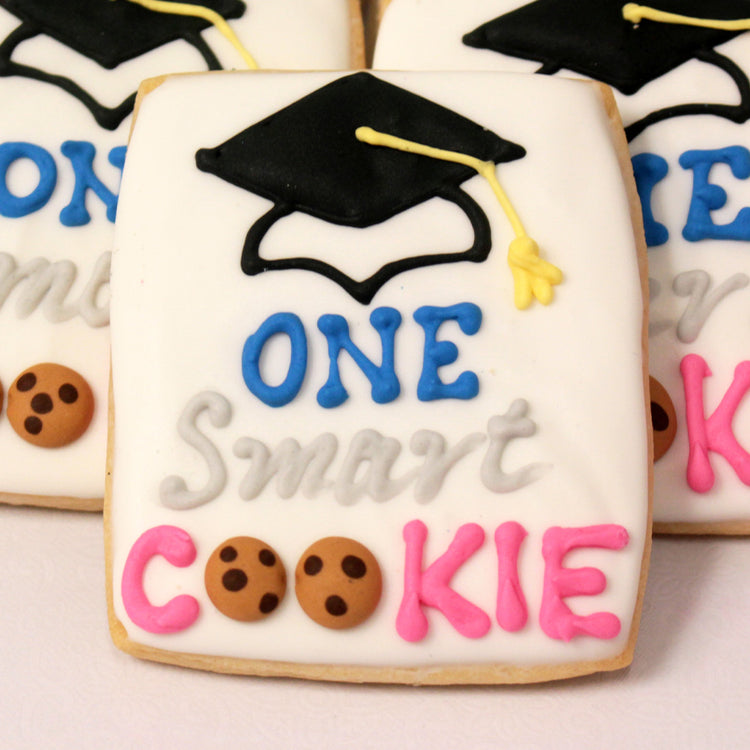 Graduation theme cookies with One Smart Cookie icing design