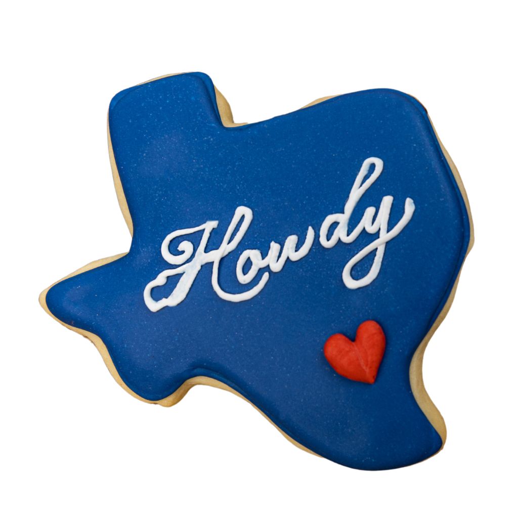 Texas-shaped cookie with blue icing and white Howdy text.