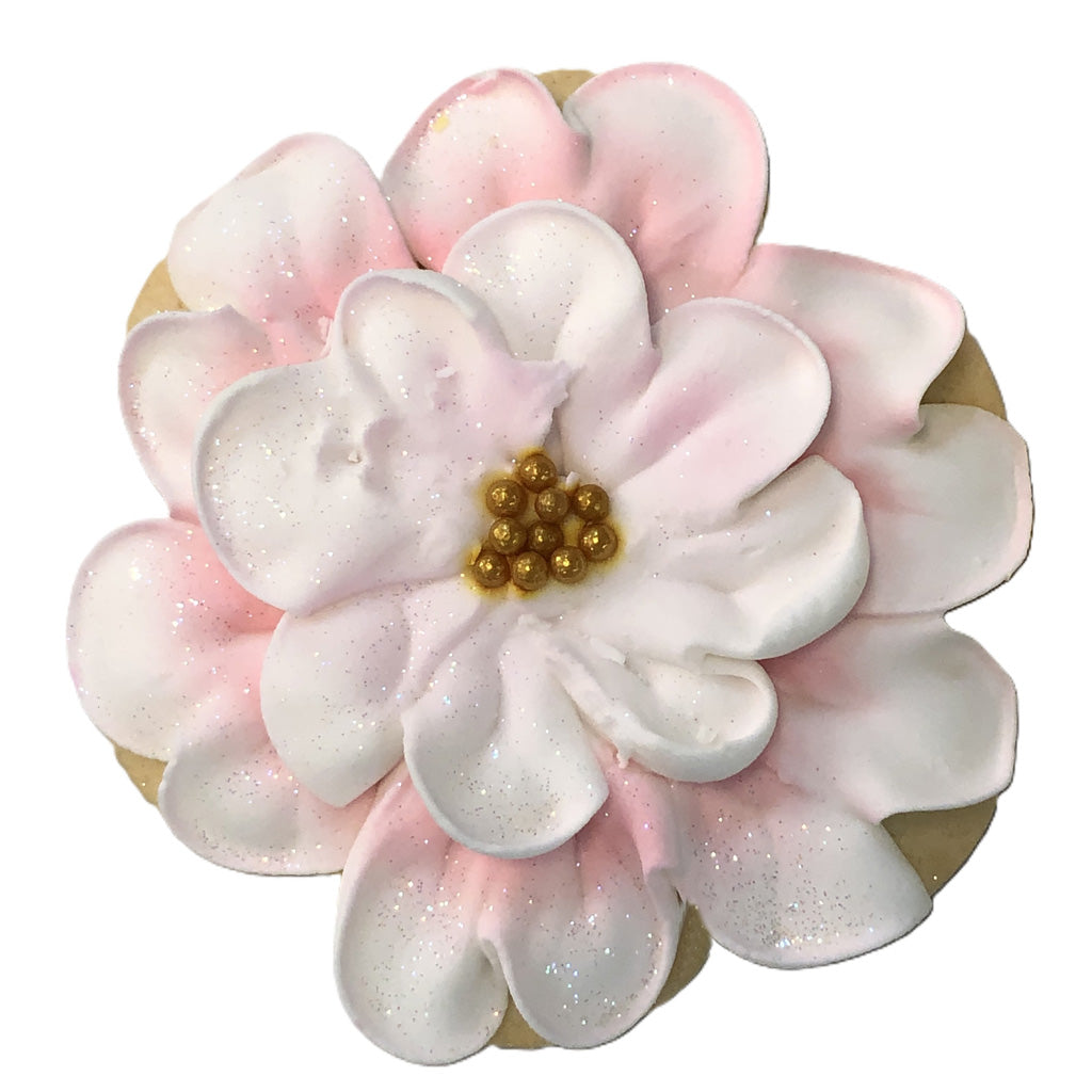 Pink and white flower cookie with gold sugar pearls
