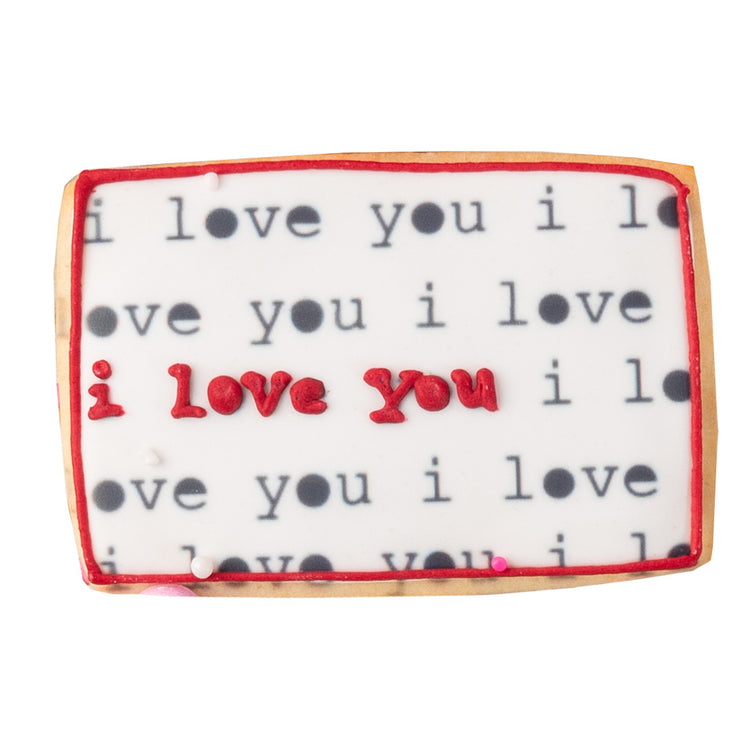 Valentine butter cookie with I love you text and red border.