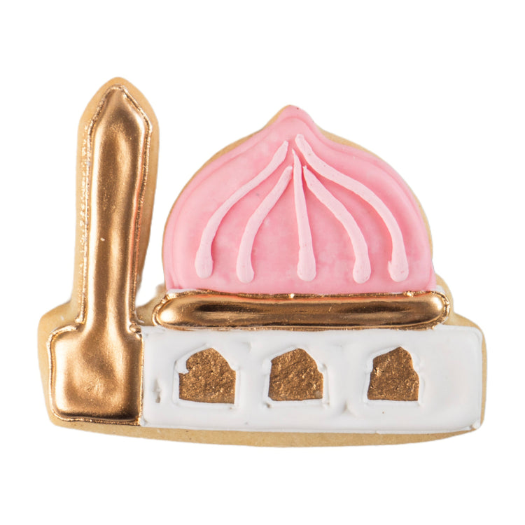 Mosque-shaped Ramadan butter cookie with pink and gold icing