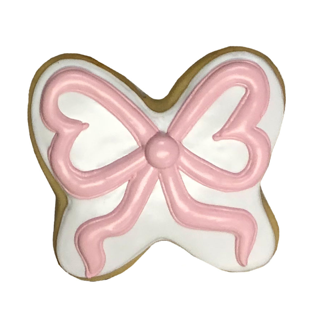 Pink bow sugar cookie with white and pink icing
