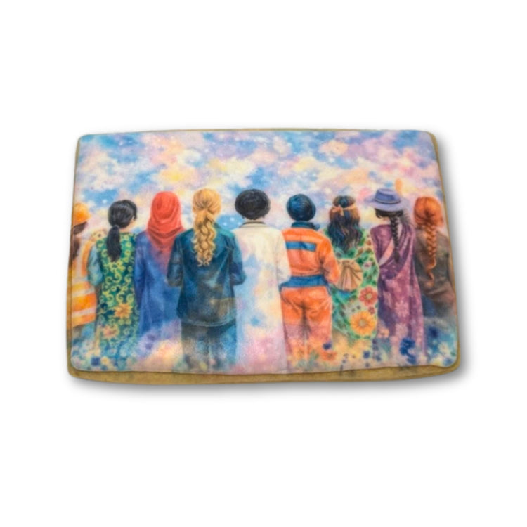 Women's History Month cookie with diverse women standing together.