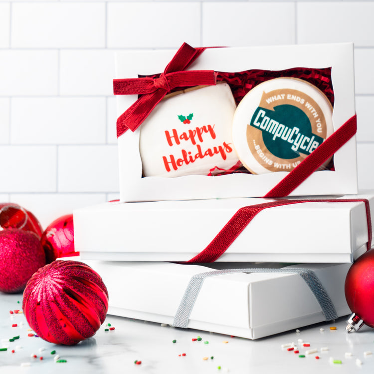 Two-pack logo cookie gift box with red holiday ribbon.