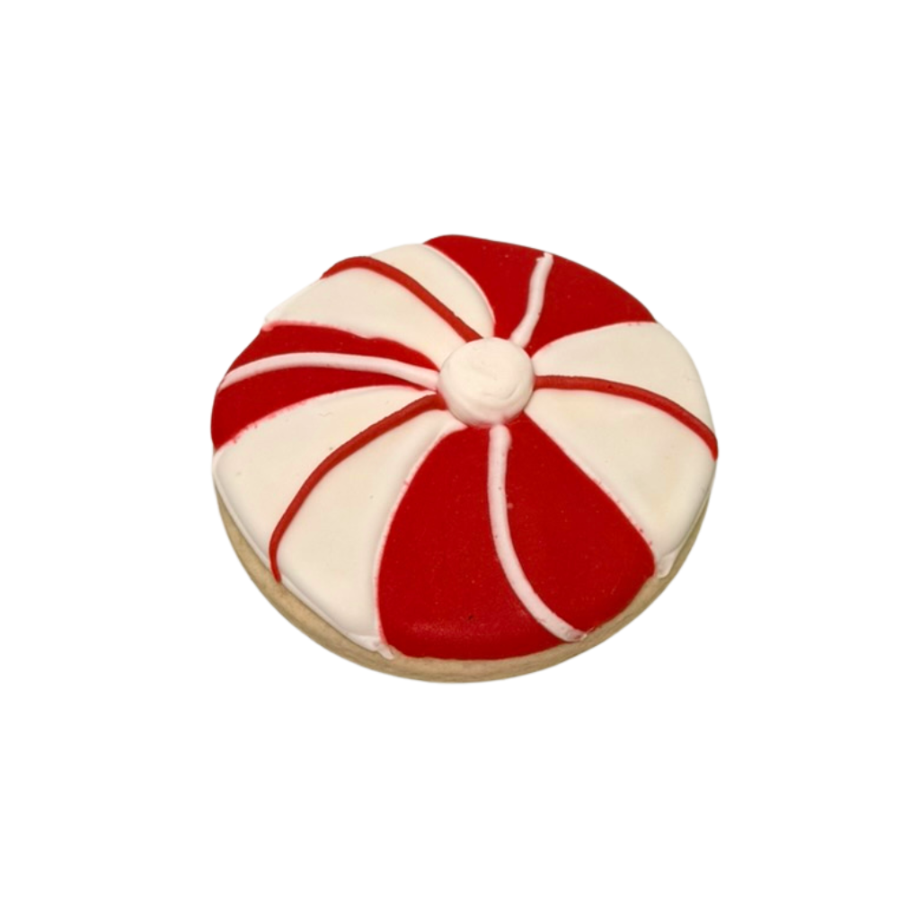 Christmas in July cookie with red and white peppermint icing.