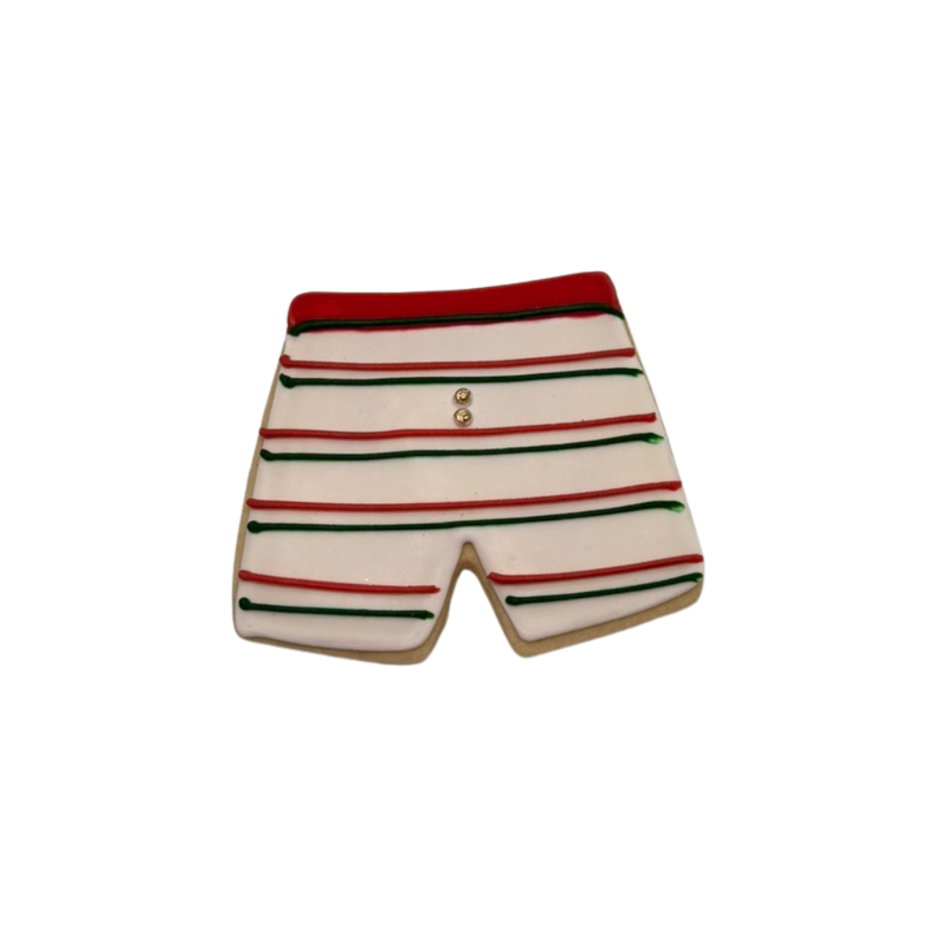 Christmas in July cookie shaped like striped swim trunks