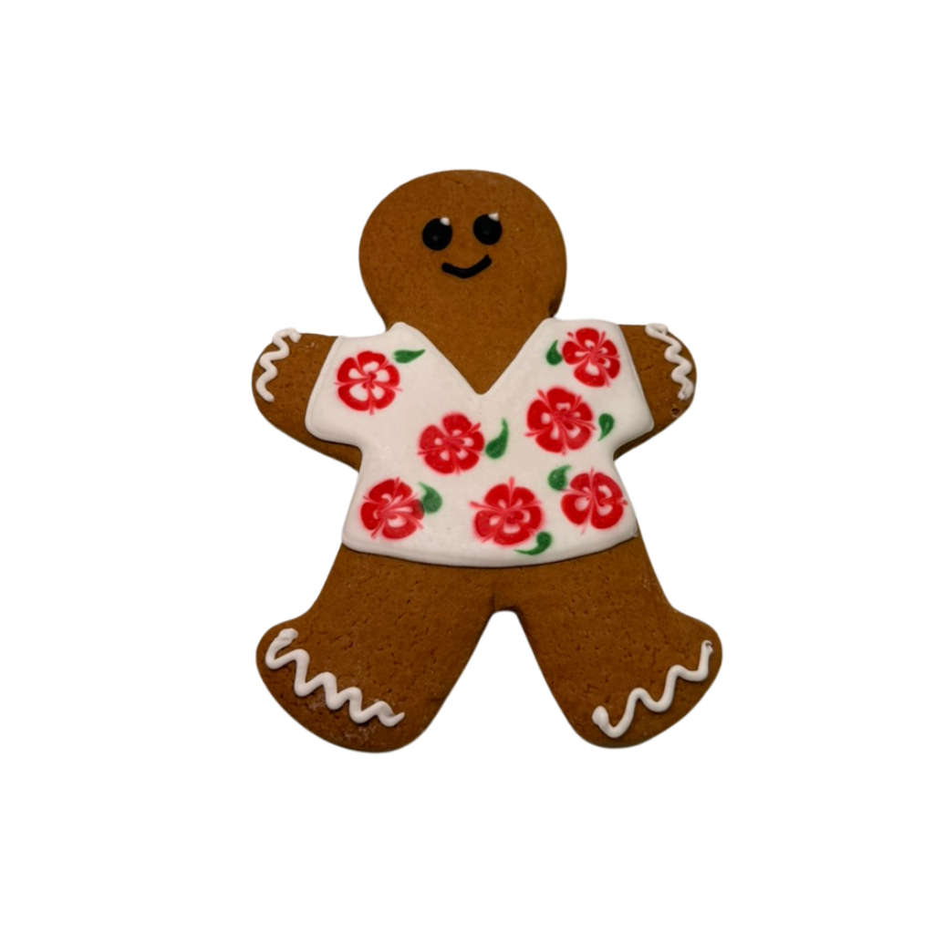 Vacation GingerPeople cookie in a floral hibiscus shirt