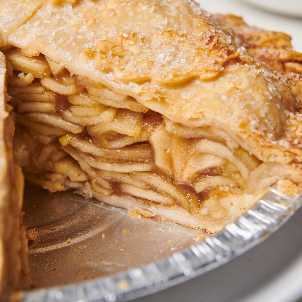 Double Crust Apple Pie with a sugar-dusted flaky golden crust.