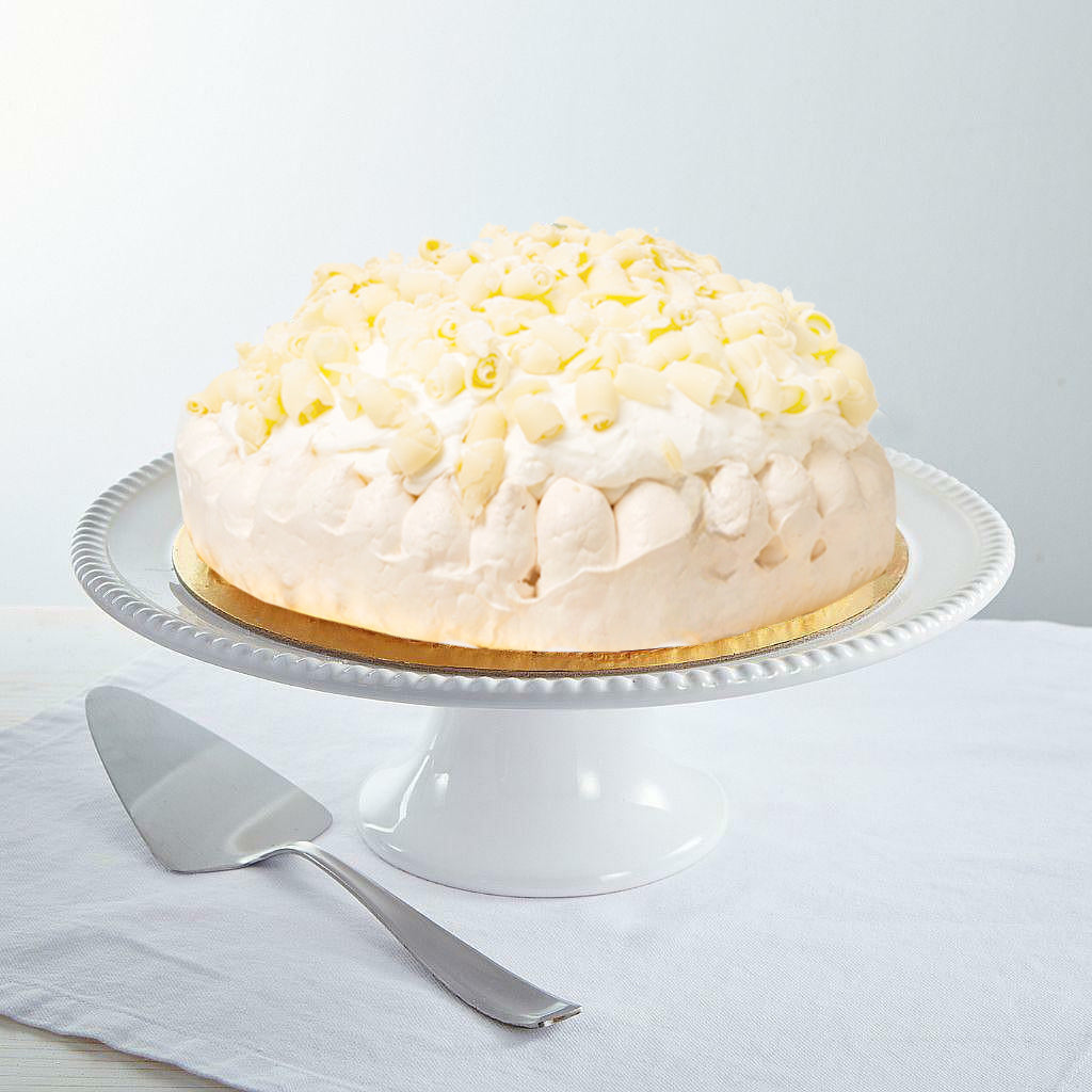 9-inch non-dairy lemon vacherin topped with white chocolate curls